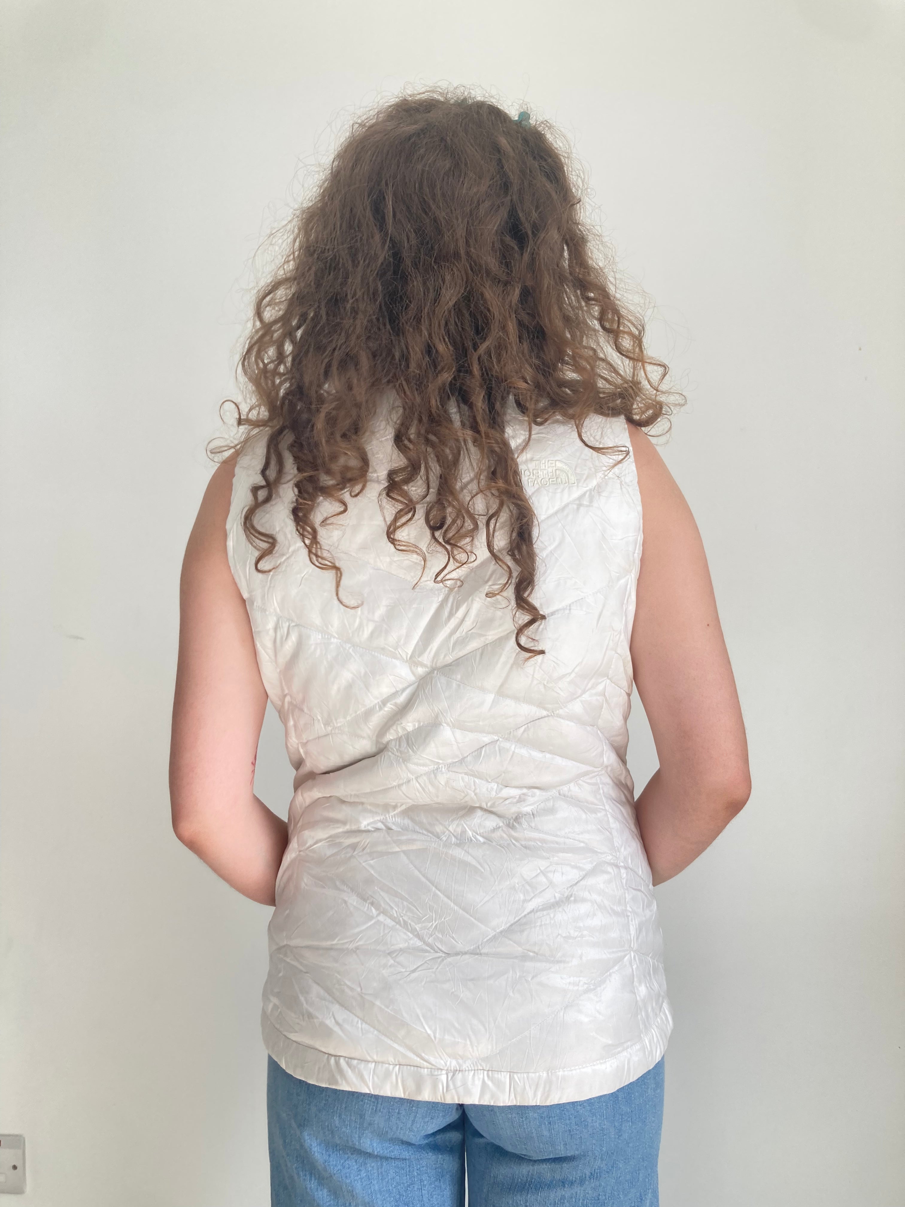 vintage white sleeveless body warmer north face