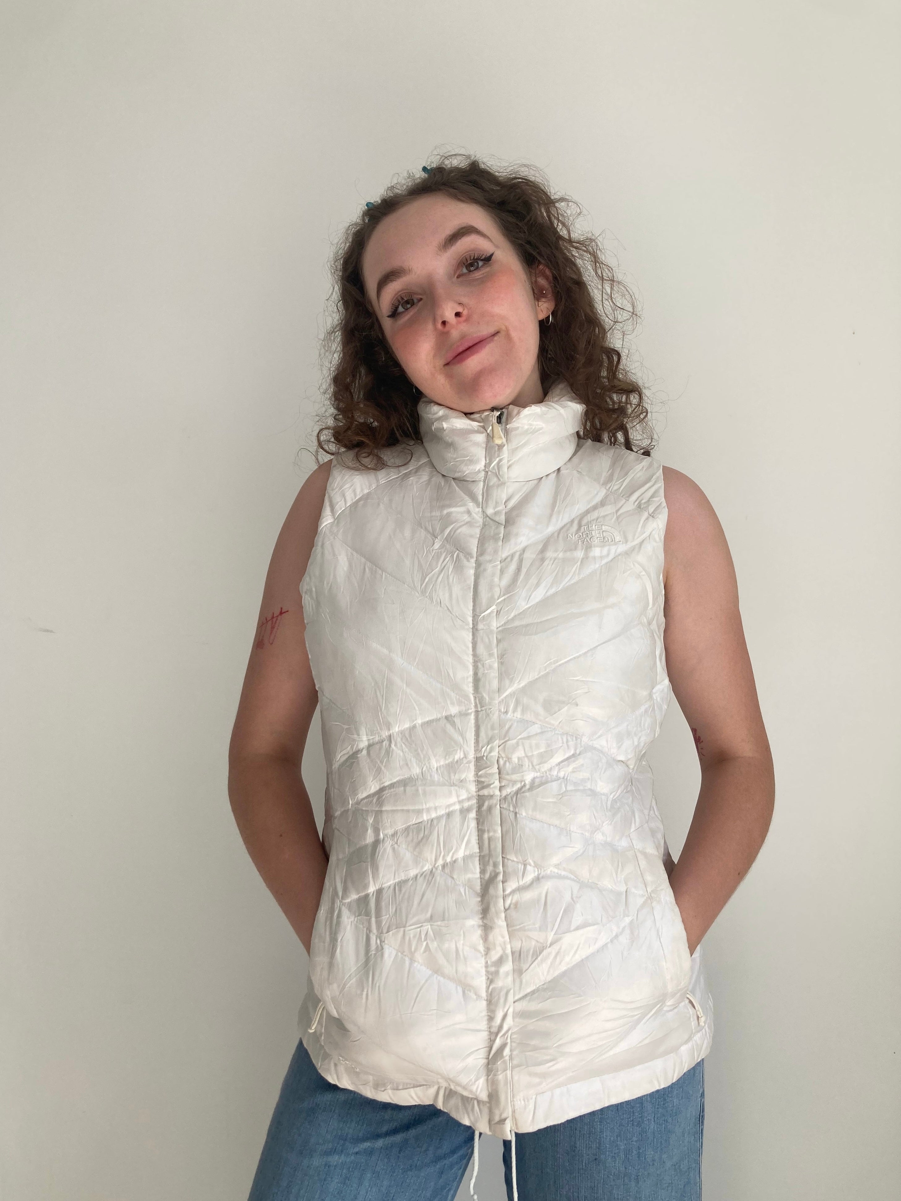vintage white sleeveless body warmer north face