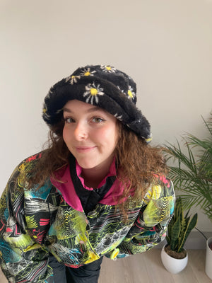 black daisy print fluffy bucket hat