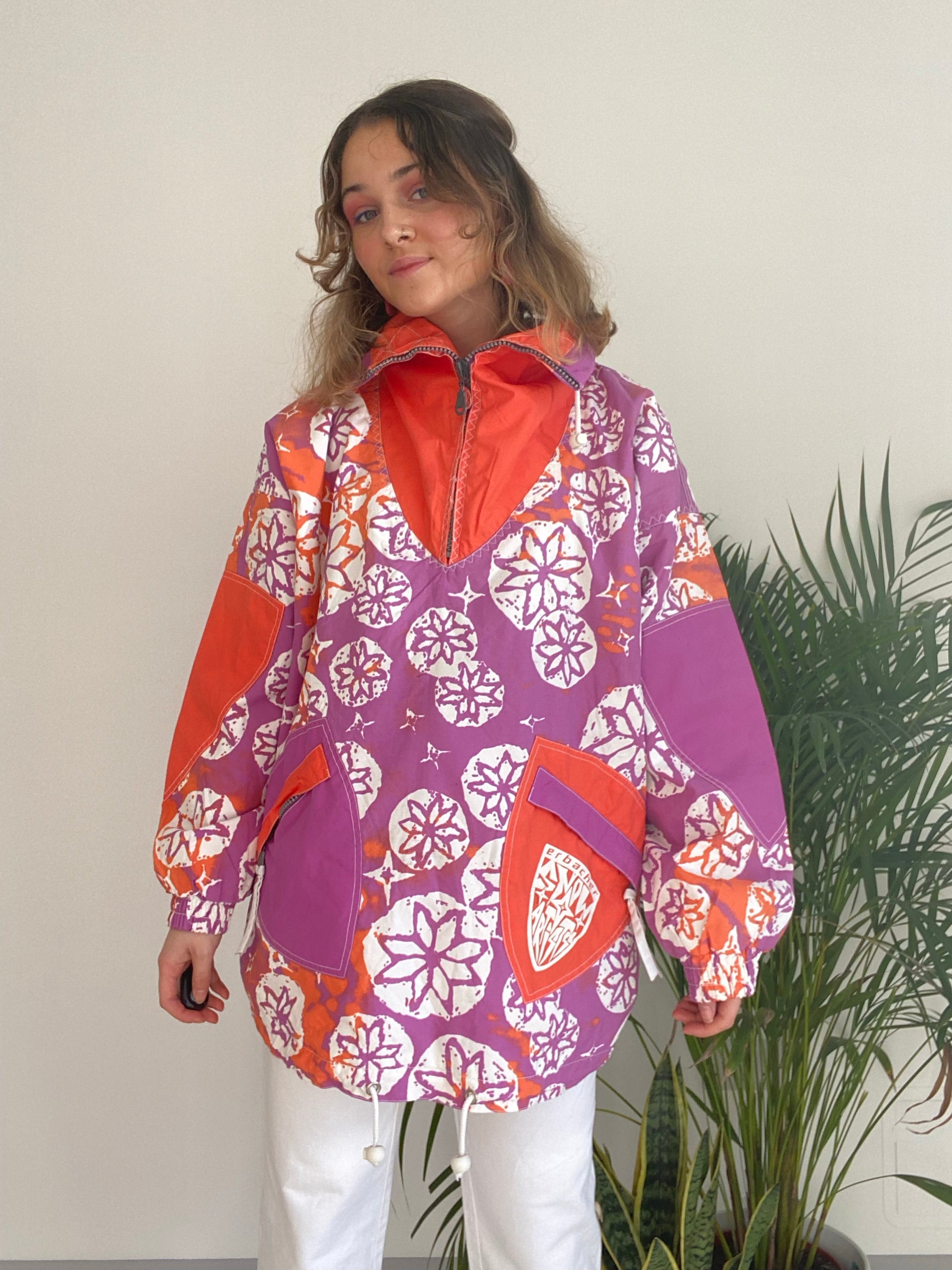 purple and orange patterned sports jacket