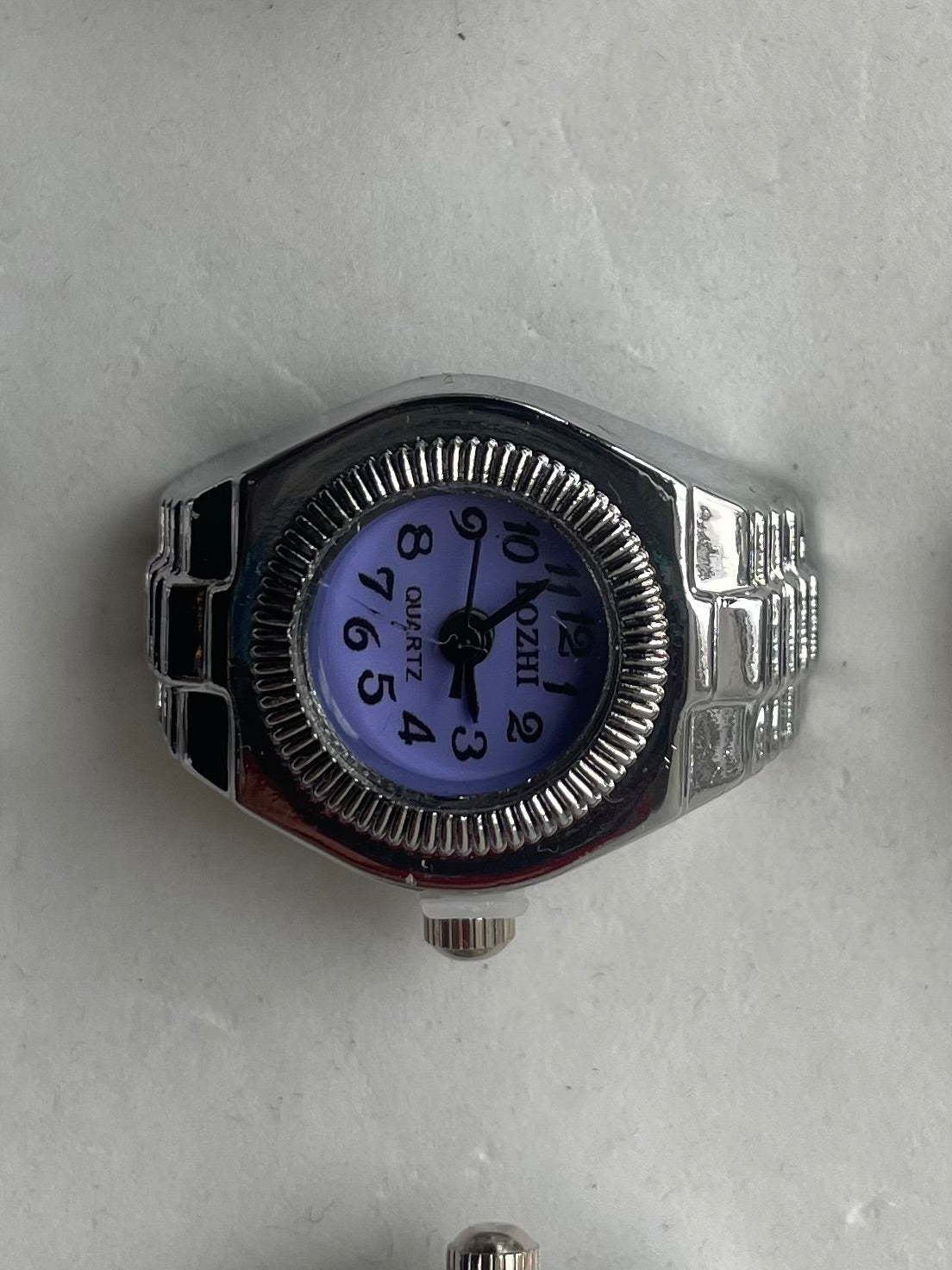 Purple face circular watch ring 