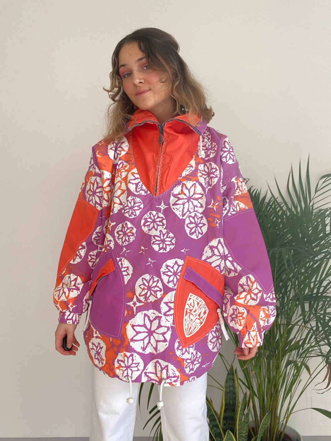 purple and orange patterned sports jacket 