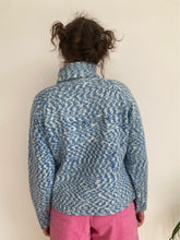 blue cable knit turtleneck sweater